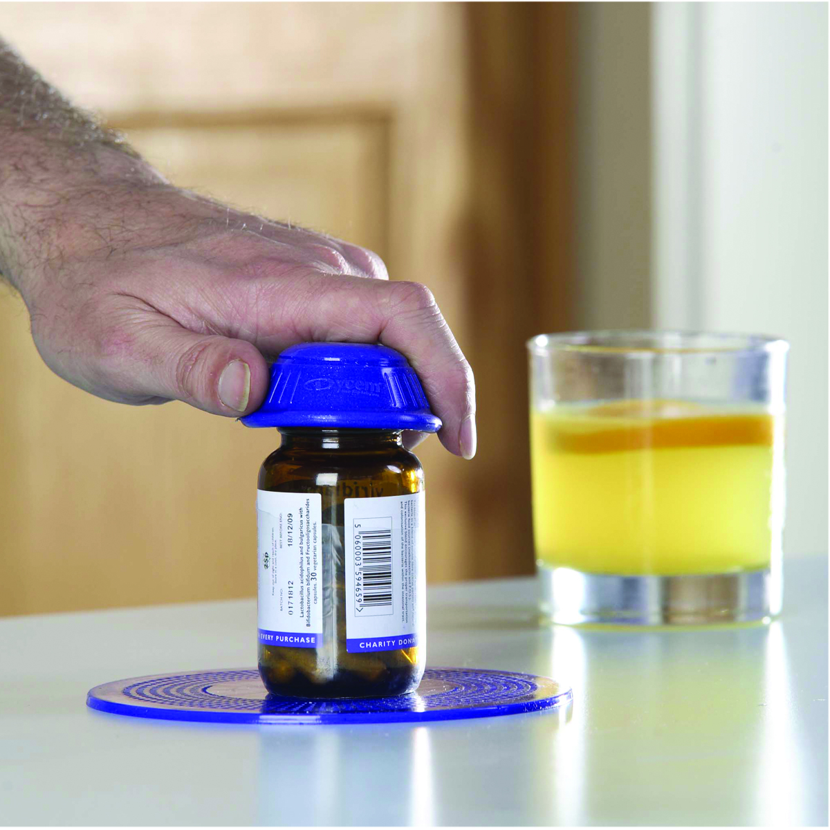 Dycem non-slip cone-shaped bottle opener blue
